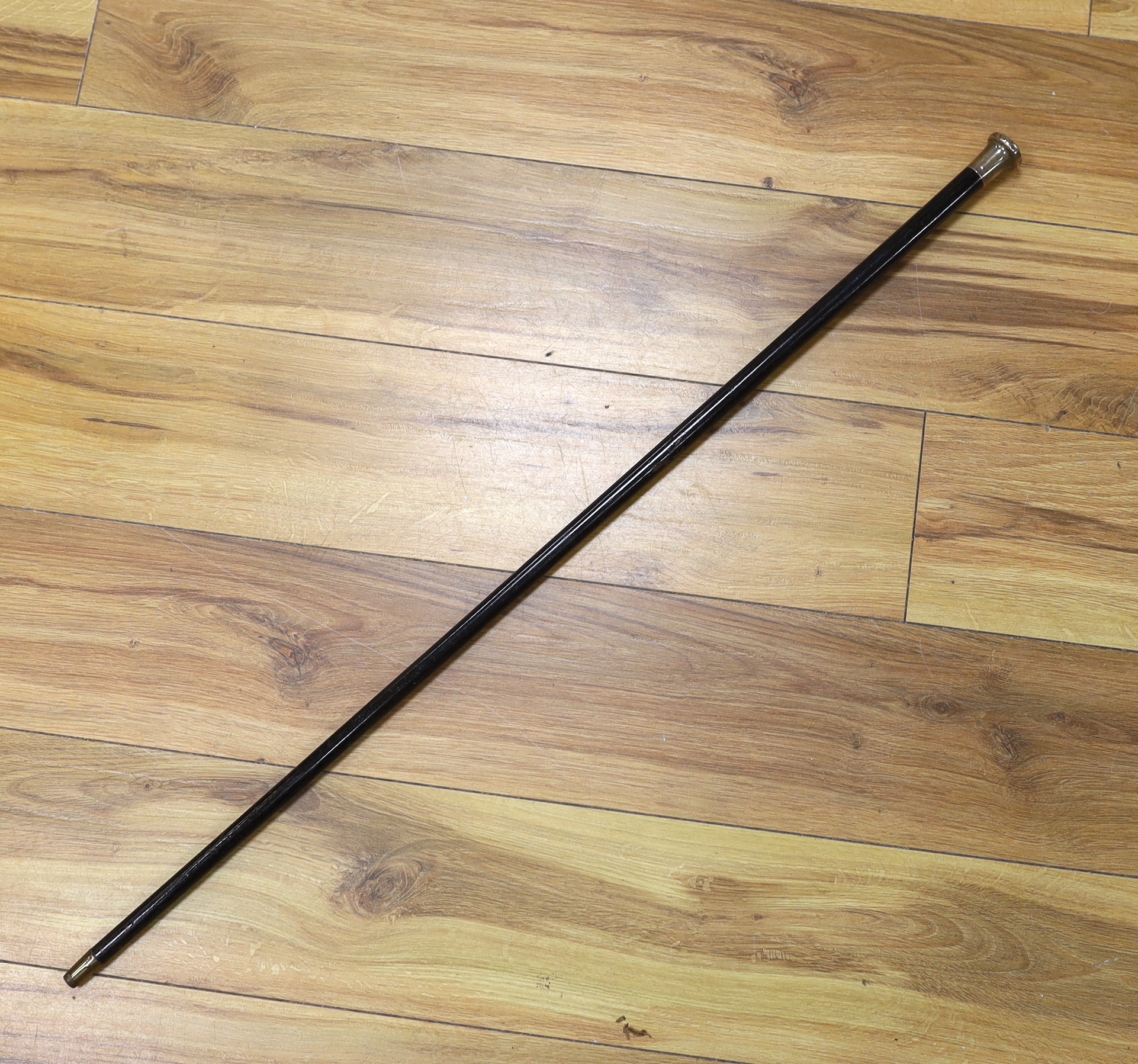 A George V silver topped ebonised cane, 91cm.